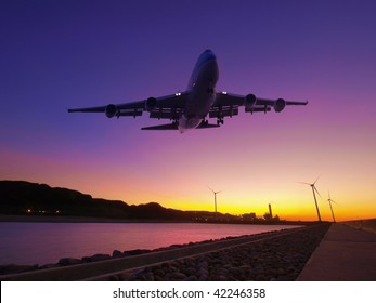 Sunset and airplane fly over river