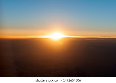 Sunset From An Airplane Where The Earth Curvature Is Appreaciable 