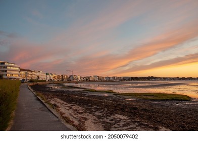 Sunset Along Sandbanks Beach In Dorset.