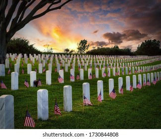 Sunset and American flags on Memorial Day at a national cemetery in southern California. - Powered by Shutterstock