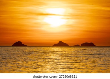 Sunset at Arpoador Beach in Rio de Janeiro, Brazil.