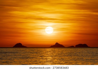 Sunset at Arpoador Beach in Rio de Janeiro, Brazil.
