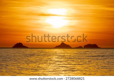 Sunset at Arpoador Beach in Rio de Janeiro, Brazil.