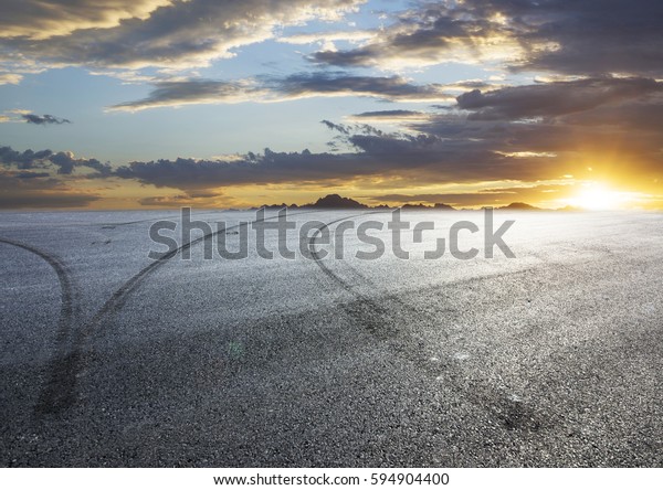Sunset asphalt asphalt tire\
marks