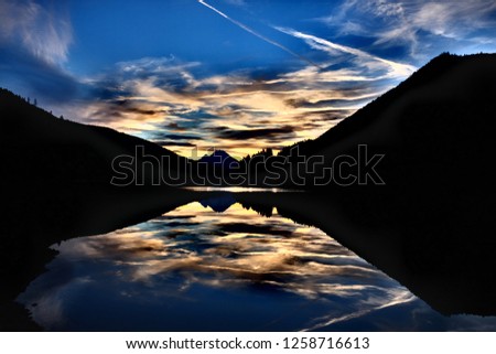 Similar – Bietschorn mountain peak at sunrise, Switzerland