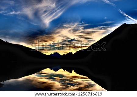 Similar – Bietschorn mountain peak at sunrise, Switzerland