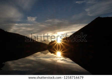 Similar – Bietschorn mountain peak at sunrise, Switzerland