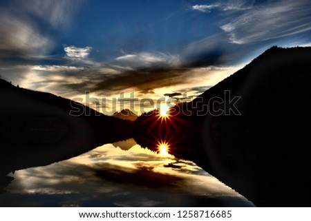 Similar – Bietschorn mountain peak at sunrise, Switzerland