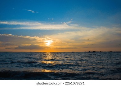 The Sunset Background From the Beach with The Sky Still Blue