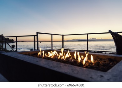 Sunset In The Backyard By The Fire Pit And The Sea.