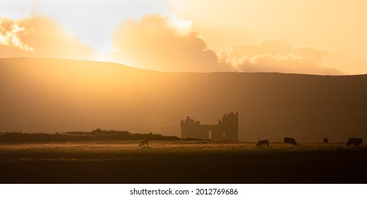 Sunset At Ballycarberry Castle On The Ring Of Kerry In Ireland.