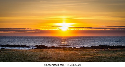 The sunset at Ballyheinan beach in County Donegal Ireland