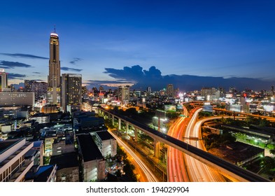 Sunset in Bangkok with Baiyok tower and express way