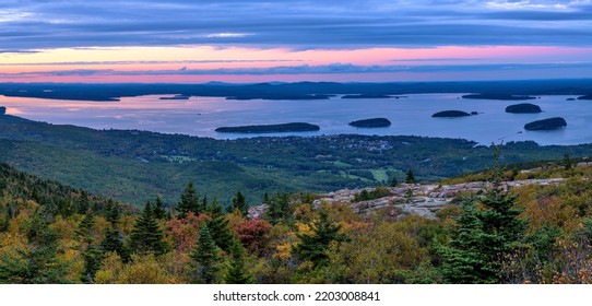 Sunset Bar Harbor - A panoramic overview of Bar Harbor and its islands at Frenchman Bay on a colorful Autumn evening, as seen from Cadillac Mountain of Acadia National Park. Maine, USA.