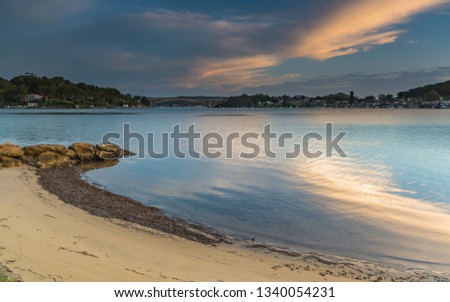 Sunset Bay Waterscape with High Clouds - Taken at Solstice Point on St Huberts Island, Central Coast, NSW, Australia.
