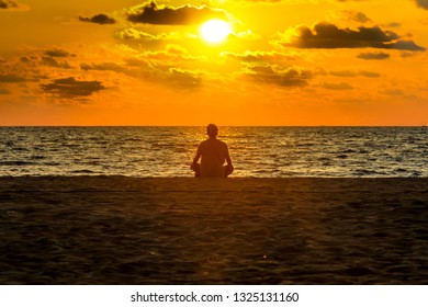 Sunset at the beach - Shutterstock ID 1325131160