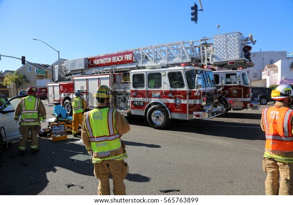 Sunset Beach, California - JANUARY 27, 2017:\
Sunset Beach- Huntington Beach Fire, Police and Ambulance services\
tend to a major traffic collision taking the injured to the\
hospital for\
treatment.\
