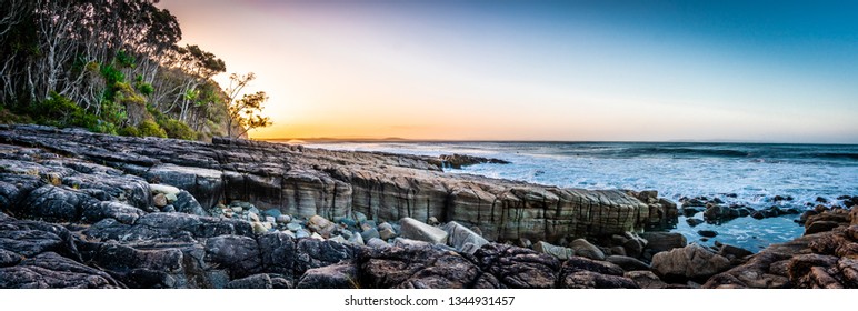 Sunset Of Beach Rocks Noosa Australia