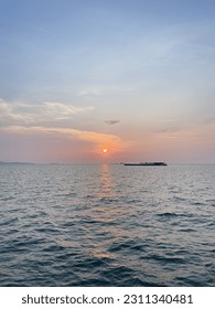 Sunset beach sea sky orange - Shutterstock ID 2311340481