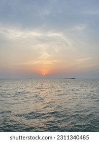 Sunset beach sea sky orange - Shutterstock ID 2311340485