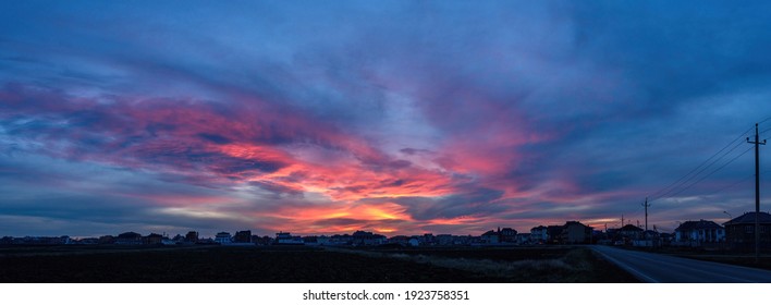 Sunset With Beautiful Clouds Over The City