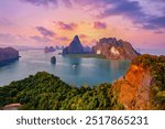 Sunset beautiful landscape of nature Thailand, Long tail boat with tourist on Hong tropical island and Phang Nga bay in turquoise sea, aerial view.