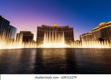 Sunset behind the Bellagio and Caesar's Palace Hotels, Las Vegas, Nevada, USA, February 2012