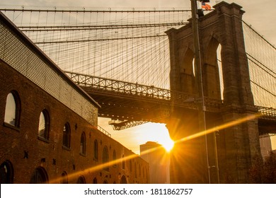Sunset Behind the Brooklyn Bridge in New York 