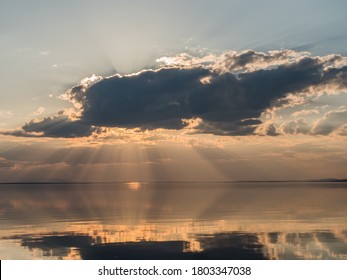 Sunset Behind The Clouds With Godrays Over The Lake Storsjön, Jämtland