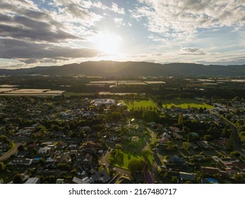 Sunset Behind The Mountains Of Te Puke City. Bay Of Plenty Region, New Zealand