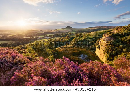Sunset behind Roseberry Topping, taken from Cockshaw Hill in the North York Moors National Park. Stock photo © 