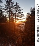 Sunset behind trees captured on the Siri Paye mountain in Shogran, Pakistan