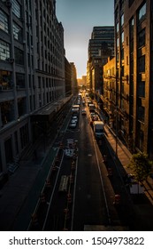 Sunset being the vanishing point between buildings 