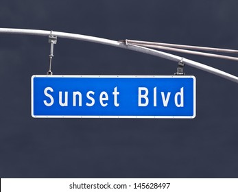 Sunset Blvd Overhead Street Sign With Dark Storm Sky.