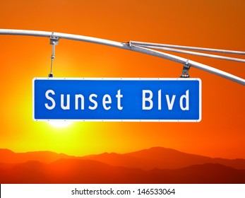 Sunset Blvd Overhead Street Sign With Orange Dusk Sky.