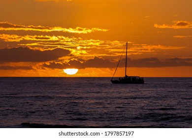 Sunset With Boat Silhouette In South Kohala, Hawaii