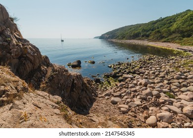 Sunset In Bornholm Island In Rocky Beach. Summer Time, Bornholm Danish Island.