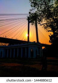 Sunset with bridge and tree