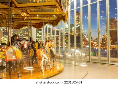 Sunset of the Brooklyn Bridge and Jane's Carousel at New York