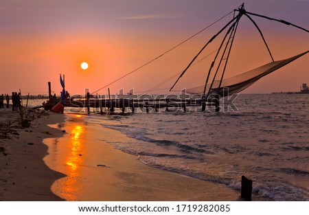 Sunset by the Chinese fishingnets on the Cochin coast, India