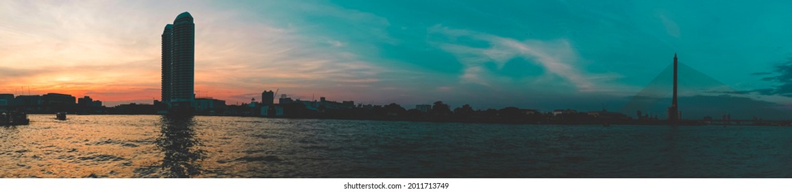Sonnenuntergang am Fluss in Bangkok, Thailand