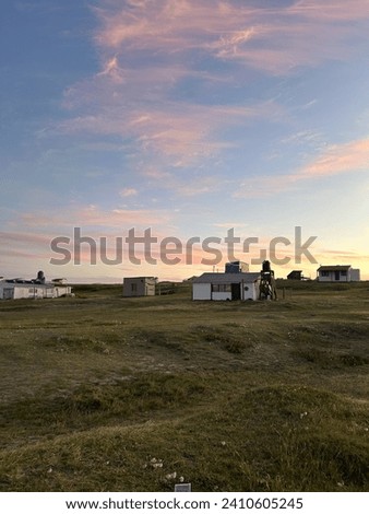 Similar – Wanderer am Polarmeer in Mitternachtssonne