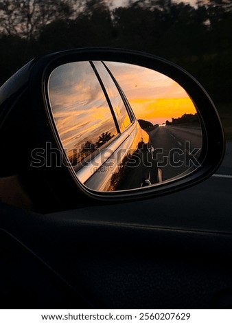 Sunset in a car side mirror 