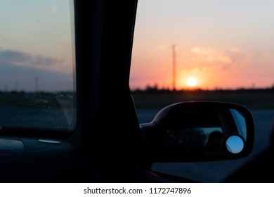 Sunset From The Car Window