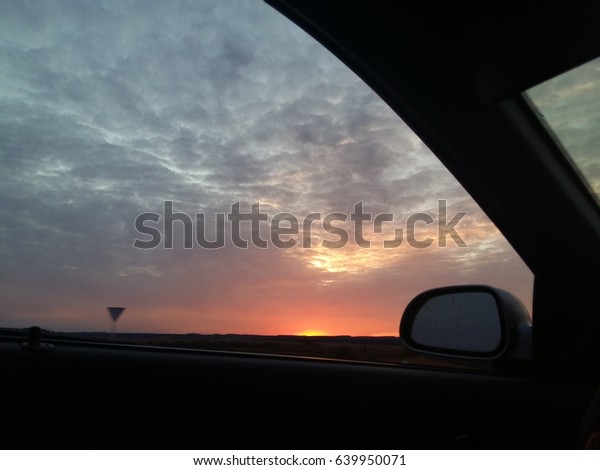 Sunset in the car\
window