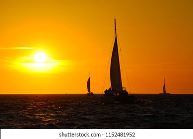 Sunset From A Catamaran In Santorini