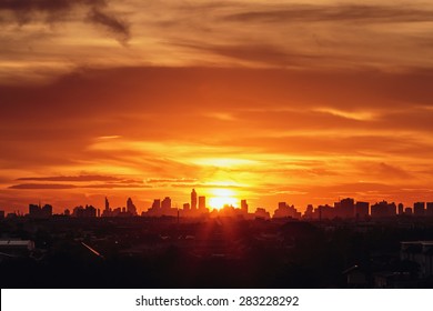 Sunset at city of Bangkok with  building silhouette - Powered by Shutterstock