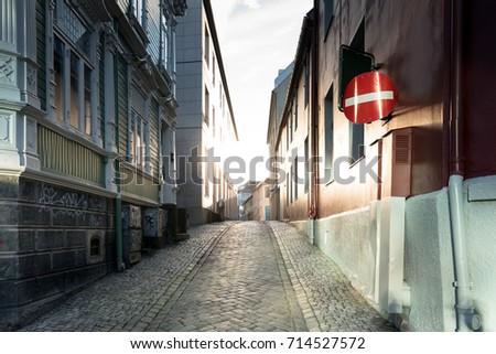 Sunset, city street and building in Trondheim, Norway