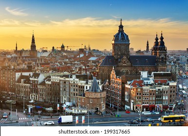 Sunset cityscape in winter of the skyline of Amsterdam, the Netherlands. 