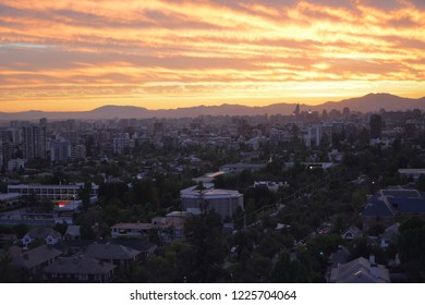 Sunset clouds and cityscape
